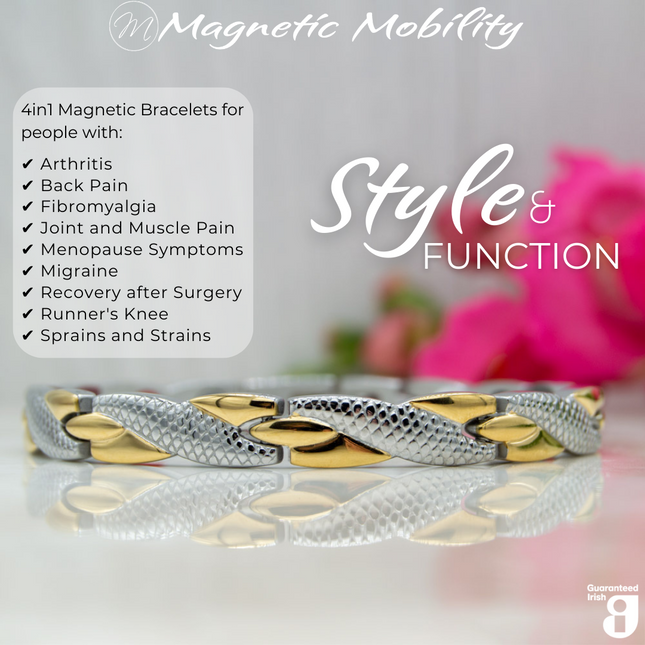 Front view of the Snapdragon Moon 4in1 Magnetic Bracelet, silver and gold coloured bracelet with snakeskin type designs, designed for pain relief, featuring various therapeutic elements. The bracelet is shown on a reflective surface with a pink flower behind it.