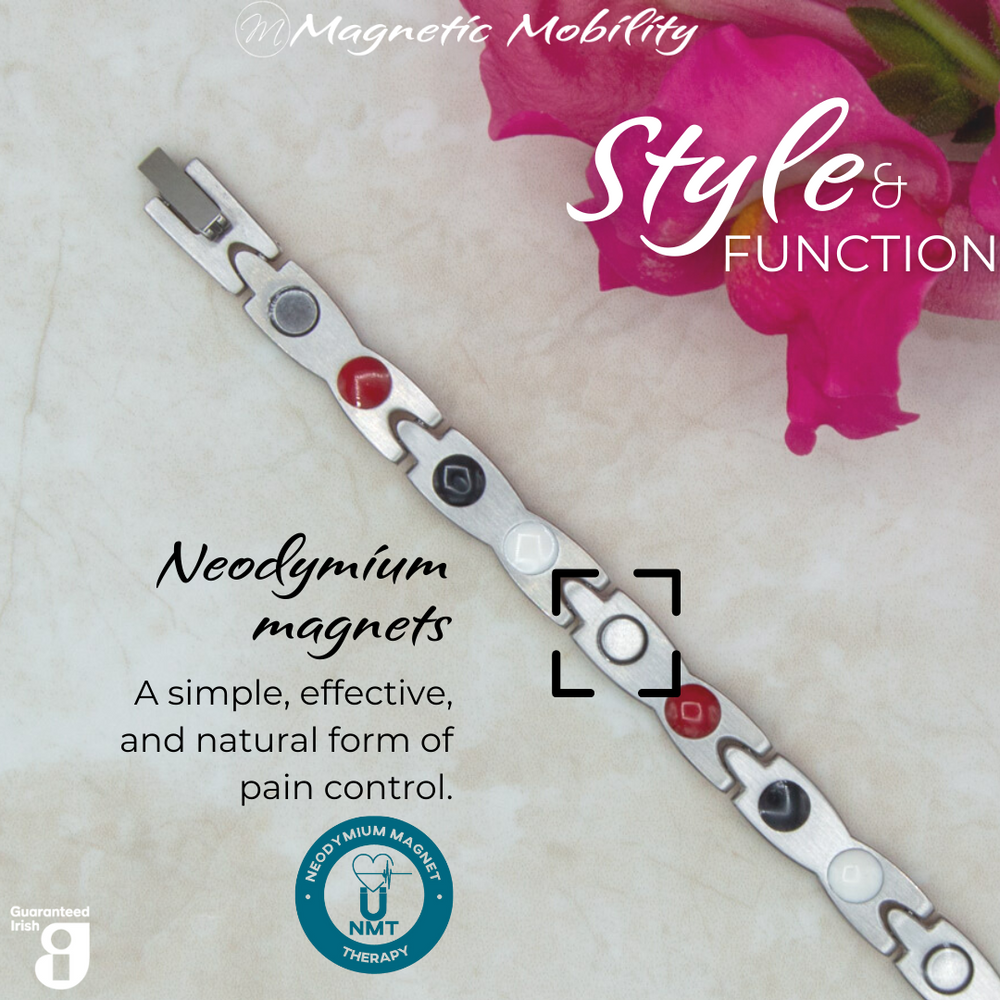 
                  
                    Load image into Gallery viewer, Snapdragon Star 4in1 magnetic bracelet from Magnetic Mobility, highlighting neodymium magnets which offer a simple, effective, and natural form of pain control. Perfect for alleviating arthritis, back pain, fibromyalgia, and more.
                  
                