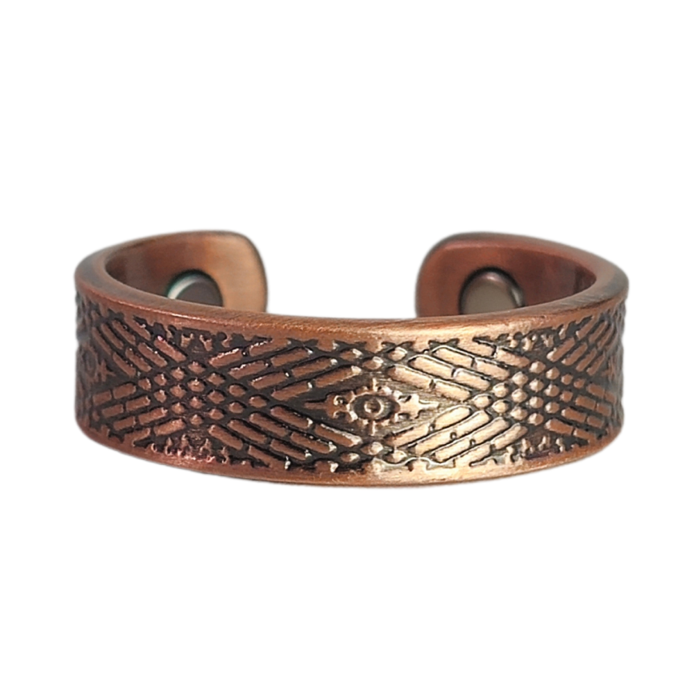 Hawthorn copper ring by Magnetic Mobility featuring an intricate geometirc design. This adjustable ring is designed to be easily worn on arthritic fingers, providing both style and functionality.