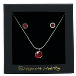 January Magnetic Mobility Birthstone Gift Set featuring a Magnetic Necklace and Stud Earrings featuring January garnet red Swarovski crystals, elegantly presented in a black box with Magnetic Mobility branding. These magnetic back earrings offer stylish pain relief.