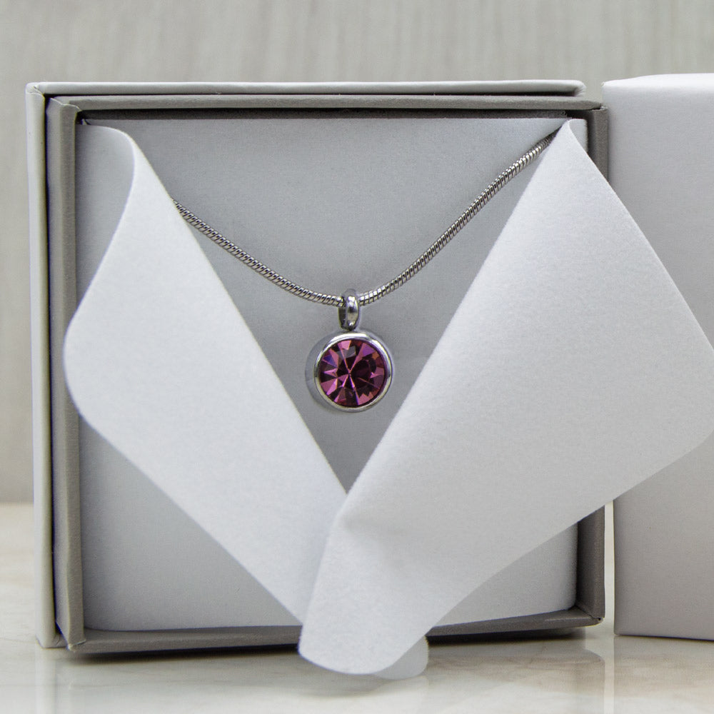 
                  
                    Load image into Gallery viewer, Pink Toumaline Magnetic Necklace in a white gift box. 
                  
                